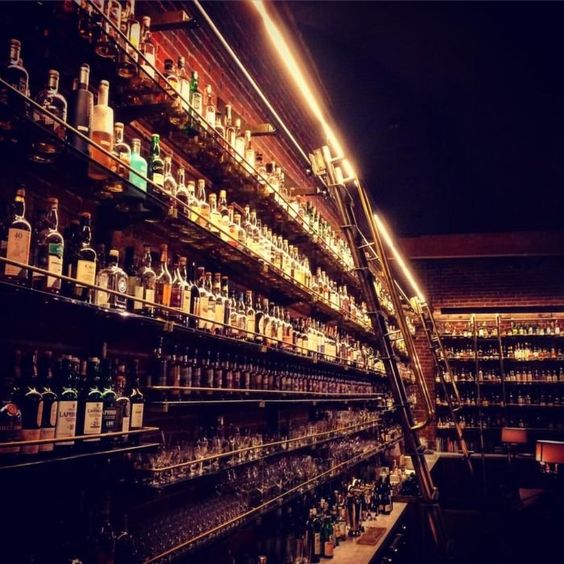 shelves with bottles of alcohol